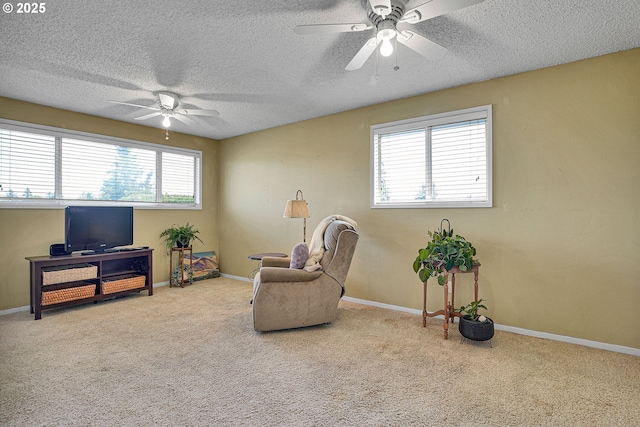 4729 SE Concord Rd, Milwaukie, OR 97267 - sitting room featuring ceiling fan, a textured ceiling, carpet floors, and baseboards