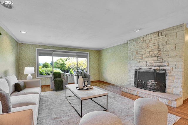 4729 SE Concord Rd, Milwaukie, OR 97267 - living area with ornamental molding, wallpapered walls, wood finished floors, a fireplace, and baseboards