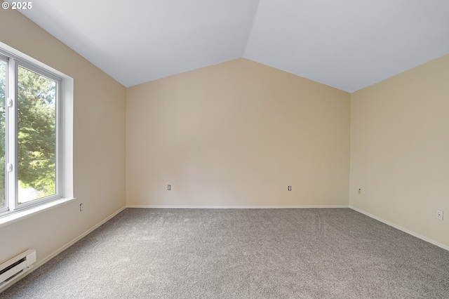 7145 SW Sagert St Unit 103, Tualatin, OR 97062 - additional living space with baseboard heating, plenty of natural light, carpet floors, and lofted ceiling