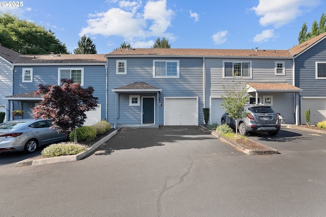 7145 SW Sagert St Unit 103, Tualatin, OR 97062 - multi unit property featuring driveway and an attached garage
