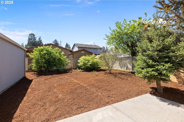 view of yard featuring a patio and a fenced backyard