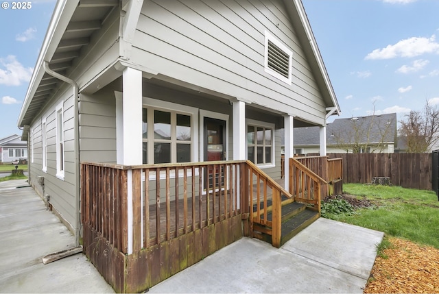 exterior space with a yard and a porch