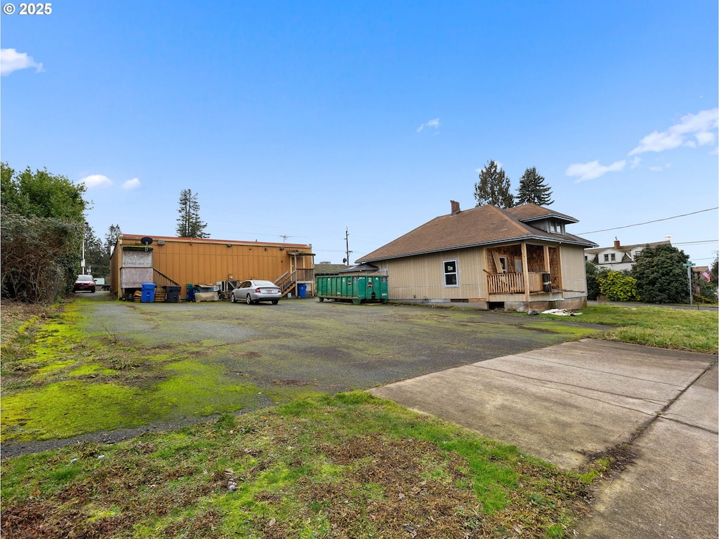 39355 Proctor Blvd, Sandy, OR 97055 - back of house featuring a chimney