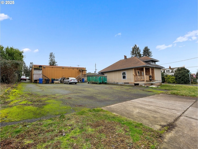 39355 Proctor Blvd, Sandy, OR 97055 - back of house featuring a chimney