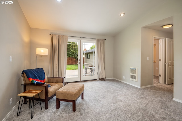 sitting room with heating unit, carpet, baseboards, recessed lighting, and vaulted ceiling