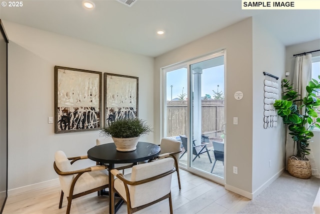 23870 SW Vermillion Dr, Tualatin, OR 97062 - dining space featuring baseboards, recessed lighting, and light wood-type flooring