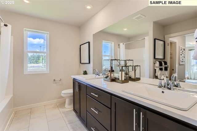 23870 SW Vermillion Dr, Tualatin, OR 97062 - bathroom with toilet, double vanity, baseboards, tile patterned floors, and shower / bath combo