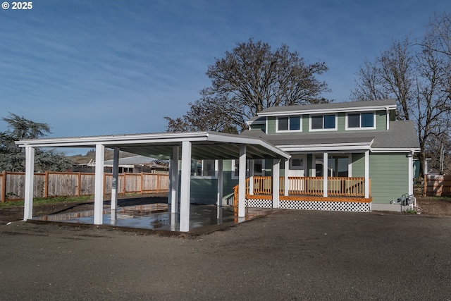 view of front of house with fence