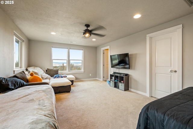 7220 SE Night Hawk Ct, Prineville, OR 97754 - bedroom with carpet, recessed lighting, a ceiling fan, a textured ceiling, and baseboards