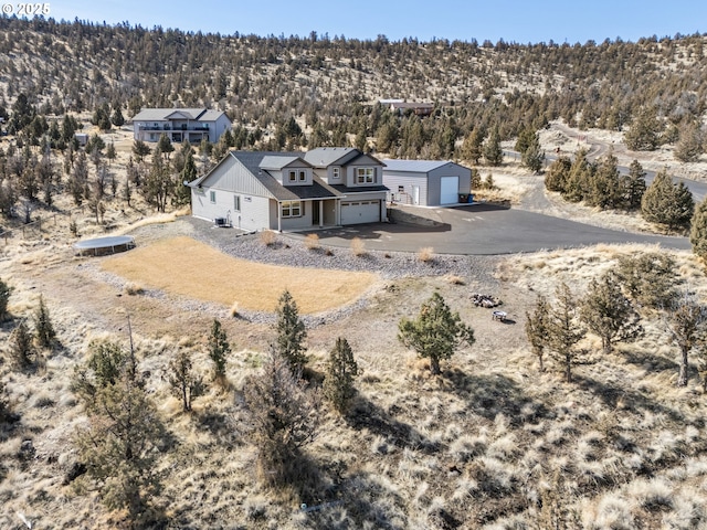 7220 SE Night Hawk Ct, Prineville, OR 97754 - aerial view featuring a wooded view