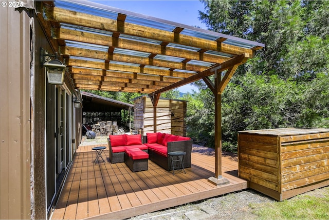 deck featuring an outdoor hangout area, a pergola, and a shed