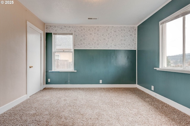 view of carpeted spare room