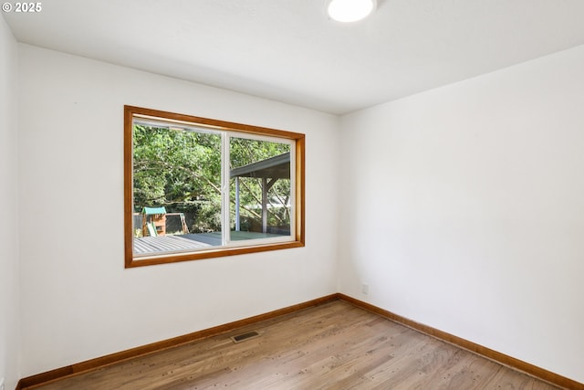 10925 NE Skidmore St, Portland, OR 97220 - unfurnished room featuring baseboards and light wood finished floors