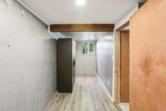 10925 NE Skidmore St, Portland, OR 97220 - hallway with light wood-style flooring and beam ceiling