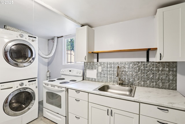 10925 NE Skidmore St, Portland, OR 97220 - laundry room with stacked washer and clothes dryer