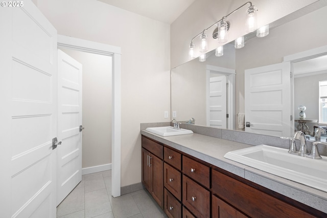 1705 Trevino Rd, Creswell, OR 97426 - bathroom with double vanity, tile patterned floors, and baseboards