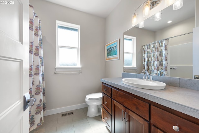 1705 Trevino Rd, Creswell, OR 97426 - full bath with vanity, toilet, tile patterned flooring, baseboards, and a shower with shower curtain