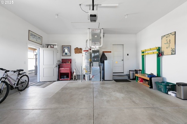 1705 Trevino Rd, Creswell, OR 97426 - garage featuring secured water heater and a garage door opener