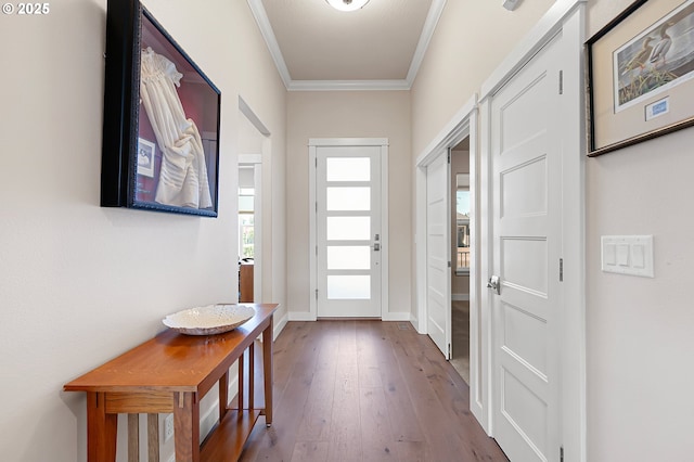 1705 Trevino Rd, Creswell, OR 97426 - doorway featuring crown molding, wood-type flooring, and baseboards