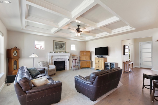 1705 Trevino Rd, Creswell, OR 97426 - living room with a fireplace, beamed ceiling, coffered ceiling, a ceiling fan, and wood-type flooring