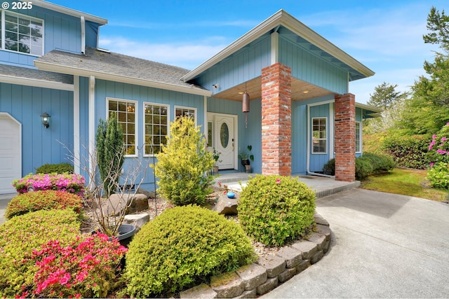 view of front of house with a porch and a shingled roof