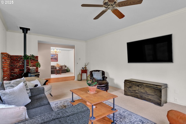living area with carpet flooring, crown molding, a ceiling fan, and a chandelier