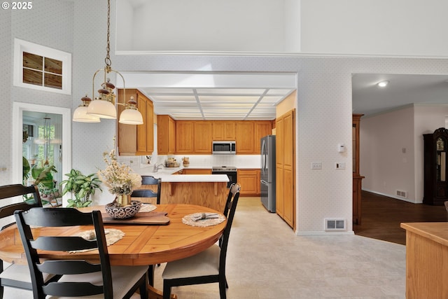 dining area with wallpapered walls and baseboards