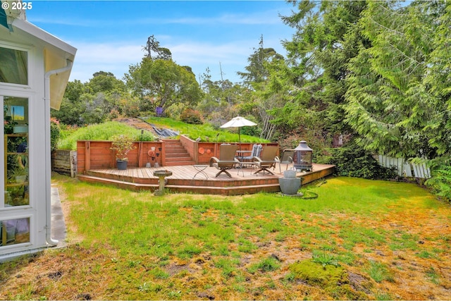 view of yard featuring a deck