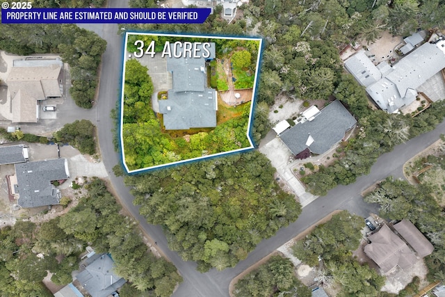 aerial view of property and surrounding area with property boundaries highlighted
