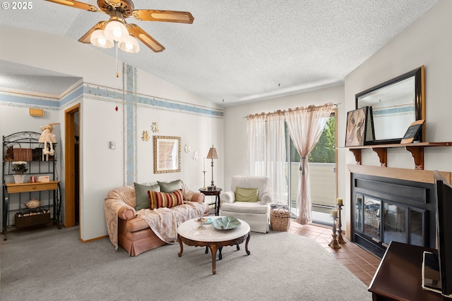 11044 SW Greenburg Rd Unit 321, Portland, OR 97223 - living area featuring vaulted ceiling, a fireplace with flush hearth, a textured ceiling, and a ceiling fan