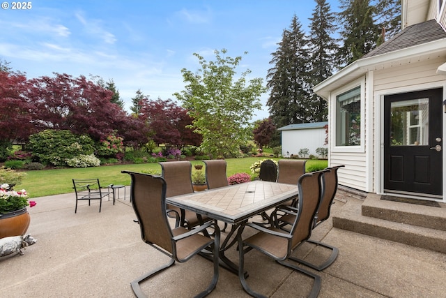 view of patio featuring outdoor dining space