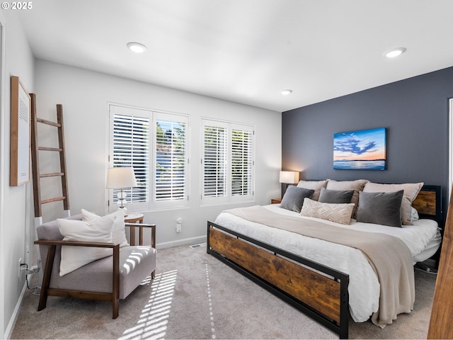 carpeted bedroom featuring recessed lighting and baseboards