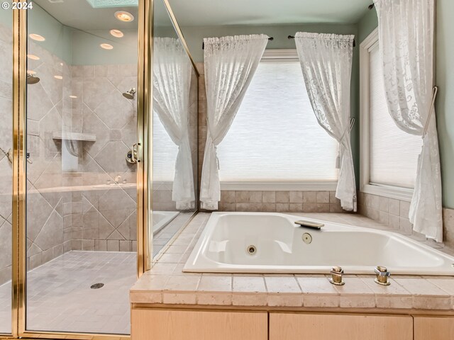 9112 NW Wiley Ln, Portland, OR 97229 - bathroom featuring a shower stall and a whirlpool tub