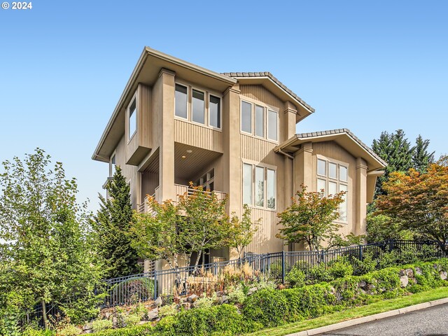 9112 NW Wiley Ln, Portland, OR 97229 - view of property exterior with a balcony