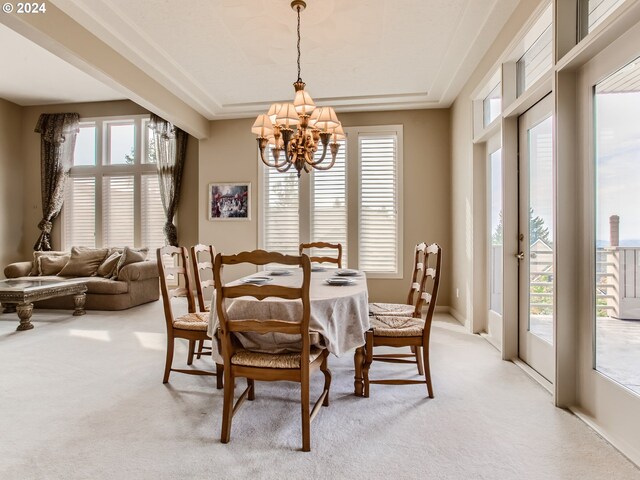 9112 NW Wiley Ln, Portland, OR 97229 - dining area featuring a chandelier, light carpet, and plenty of natural light