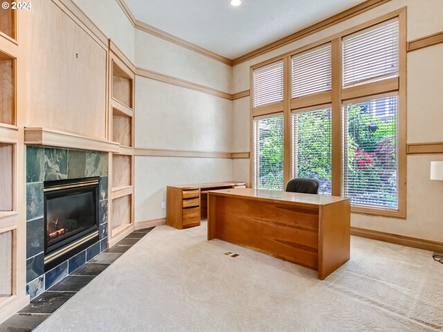 9112 NW Wiley Ln, Portland, OR 97229 - home office with ornamental molding, a tiled fireplace, carpet floors, and baseboards