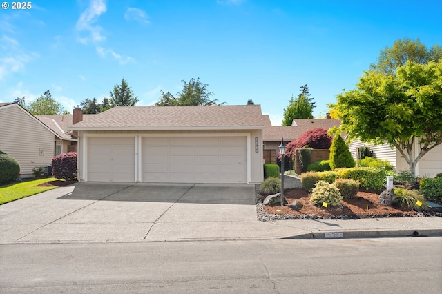 single story home with a garage, stucco siding, and driveway