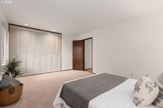 bedroom with recessed lighting and carpet flooring
