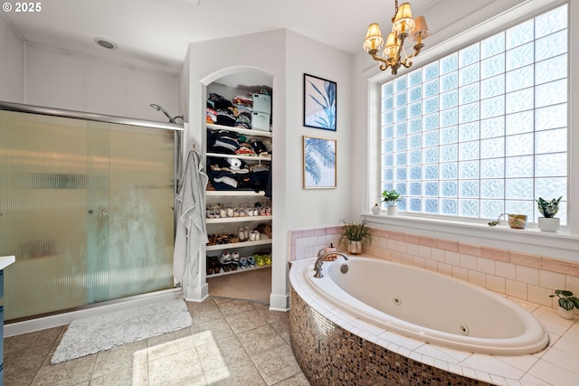 9628 N Exeter Ave, Portland, OR 97203 - full bath with a jetted tub, a stall shower, a spacious closet, and a chandelier