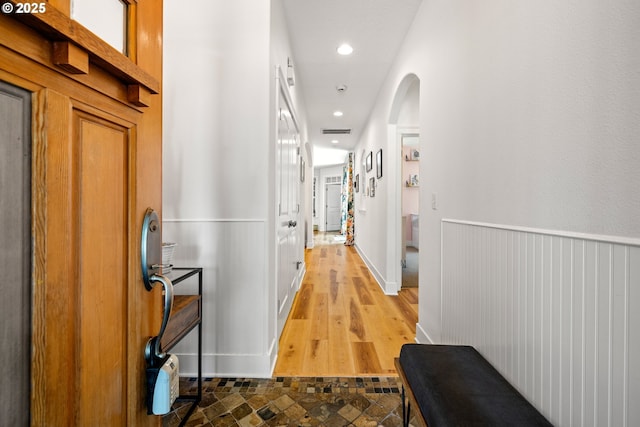 9628 N Exeter Ave, Portland, OR 97203 - corridor with arched walkways, wainscoting, and recessed lighting