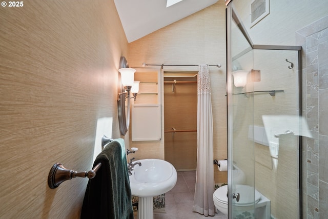 316 E 27th St, Vancouver, WA 98663 - full bathroom with vaulted ceiling, a stall shower, and tile patterned floors
