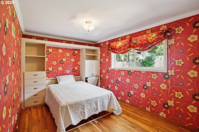 316 E 27th St, Vancouver, WA 98663 - bedroom featuring wallpapered walls, wood finished floors, and ornamental molding
