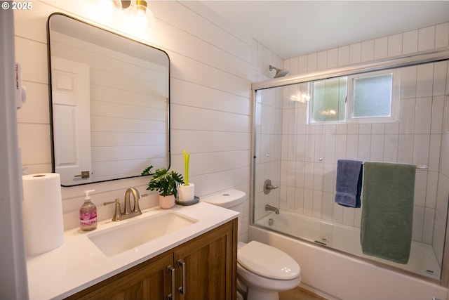 29311 Joy Ln, Ocean Park, WA 98640 - full bathroom with toilet, vanity, and bath / shower combo with glass door
