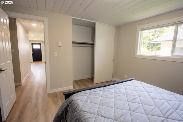 29311 Joy Ln, Ocean Park, WA 98640 - bedroom featuring wood ceiling, wood finished floors, recessed lighting, a closet, and baseboards