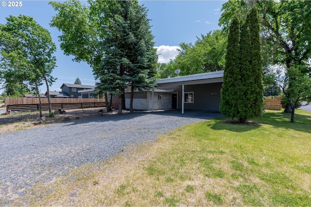 1732 SW Newberry Ave, Redmond, OR 97756 - view of front facade with driveway and an attached carport