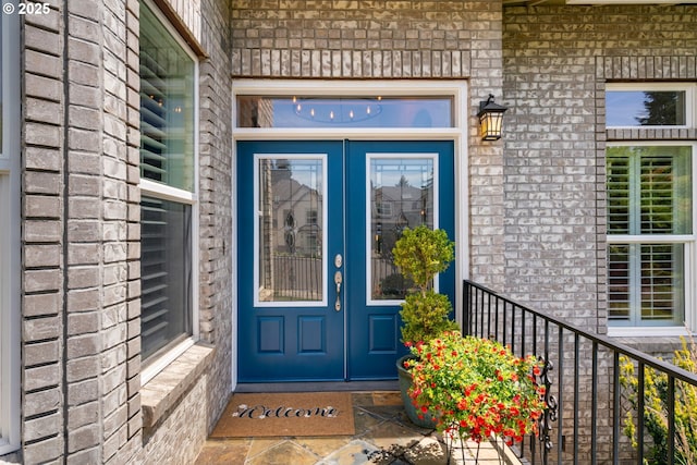 10440 SW 141st Ave, Beaverton, OR 97008 - property entrance featuring french doors and brick siding