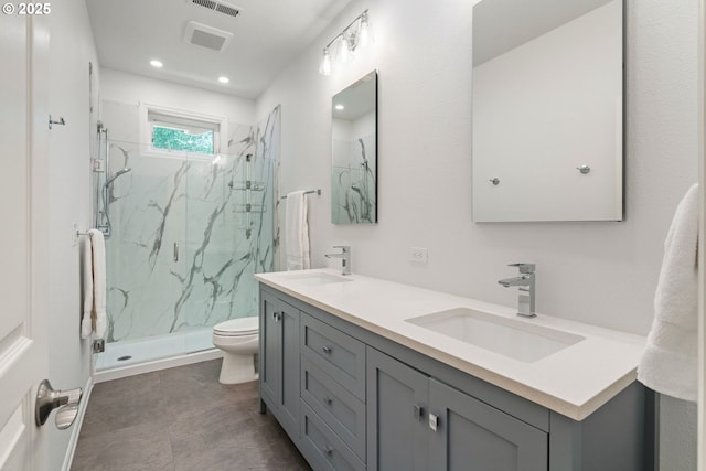 10440 SW 141st Ave, Beaverton, OR 97008 - full bath featuring double vanity, a marble finish shower, and recessed lighting