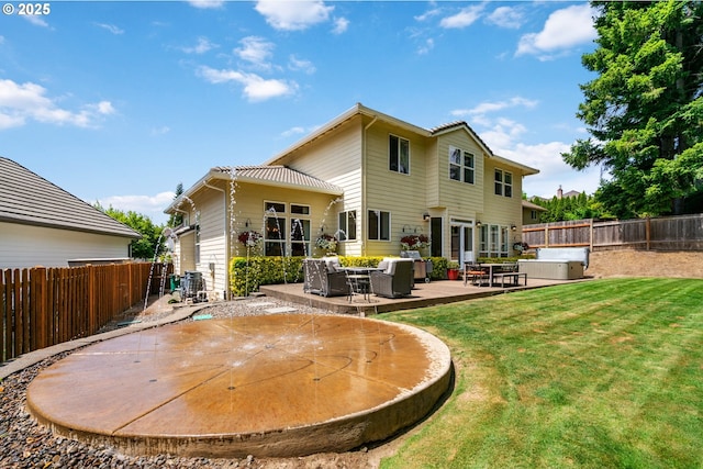 10440 SW 141st Ave, Beaverton, OR 97008 - rear view of property with a fenced backyard, a hot tub, a patio, and an outdoor hangout area