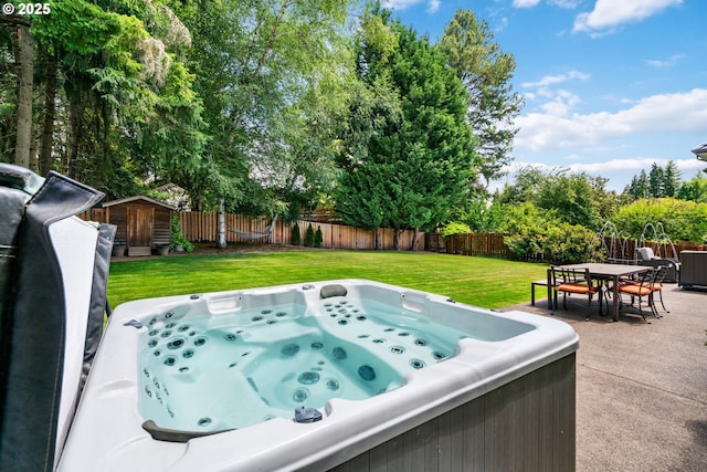 10440 SW 141st Ave, Beaverton, OR 97008 - fenced backyard with a storage shed, a hot tub, outdoor dining area, and a patio area