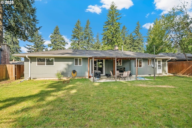 1510 SE 143rd Ave, Portland, OR 97233 - rear view of property featuring a fenced backyard, a patio, and a chimney